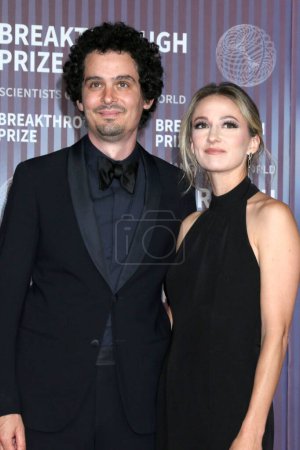 Photo for LOS ANGELES, USA - APRIL 13:  Damien Chazelle, Olivia Hamilton at the 10th Annual Breakthrough Prize Ceremony at the Academy Museum of Motion Pictures on April 13, 2024 in Los Angeles, CA - Royalty Free Image