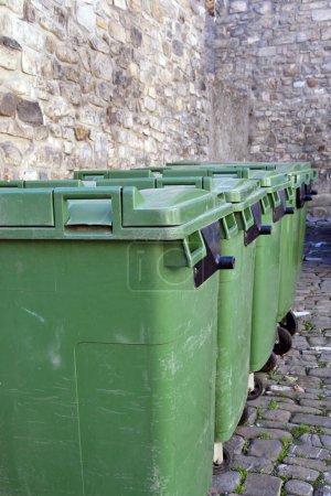 Photo for A group of dumpsters in a street - Royalty Free Image