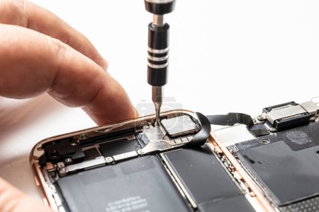 Photo for Smartphone battery replacement, repair, LCD panel replacement - Royalty Free Image