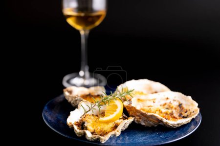 Photo for Fresh oysters that can be eaten raw cooked in gratin - Royalty Free Image
