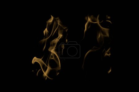 Foto de Realistic black background flame texture. - Imagen libre de derechos