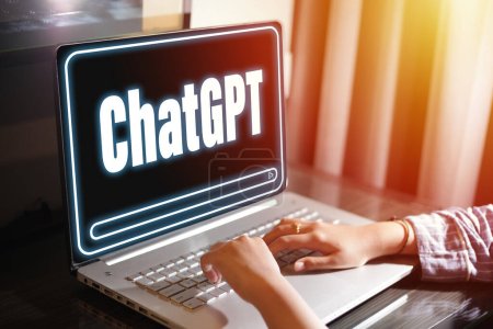 Chat with open AI technology, person using laptop chatting with ChatGPT