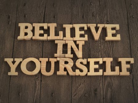 Photo for Believe in yourself, text words typography written with wooden letter, life and business motivational inspirational concept - Royalty Free Image
