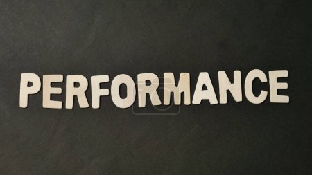 Photo for Performance text, written on wooden lettering, business term self improvement concept - Royalty Free Image