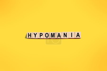 Photo for Hypomania, bipolar disorders, mental health concept, text on wooden lettering - Royalty Free Image