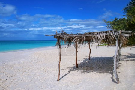 Straw hut at Fayaoue beach on the coast of Ouvea lagoon, Mouli and Ouvea Islands, Loyalty Islands, New Caledonia.