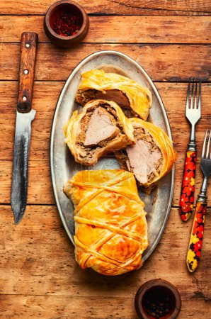 Photo for Popular delicious meat food is wellington meat, meat baked in dough. British food - Royalty Free Image