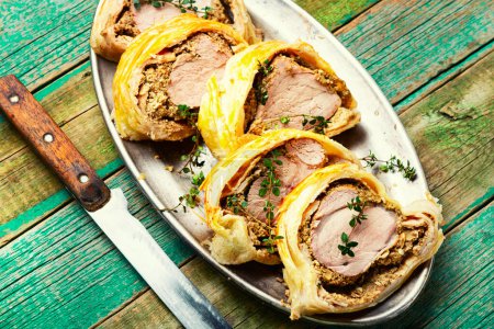 Photo for Meat dish is wellington meat, meat baked in dough. Meat loafs - Royalty Free Image