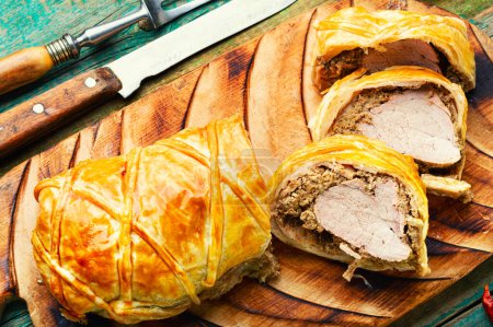 Photo for Meat dish is wellington meat, meat baked in dough. Meat loafs - Royalty Free Image