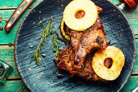 Photo for Delicious meat food ,pineapple grilled pork chop on the plate - Royalty Free Image