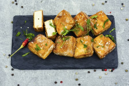 Photo for Roasted tofu cheese and sesame seeds,asian vegan food. Tahu Goreng - Royalty Free Image