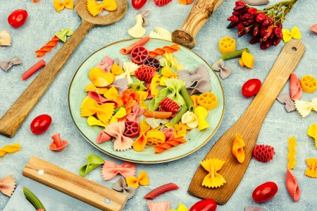 Photo for Colorful Italian pasta. Various colors of pasta on the table - Royalty Free Image