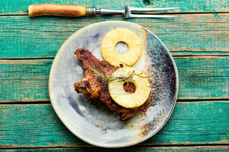 Photo for Grilled beef meat with pineapple. Steak with pineapple sauce on plate - Royalty Free Image