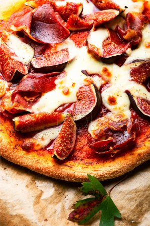 Photo for Homemade meat pizza with cheese and figs. - Royalty Free Image