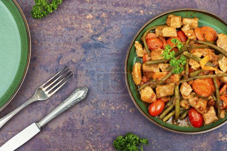 Photo for Stewed meat with carrots and french bean.Meat sauce with green beans. Copy space - Royalty Free Image
