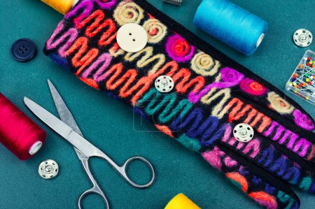 Photo for Home sewing kit, scissors, needles, buttons and colorful thread. Needlework concept - Royalty Free Image