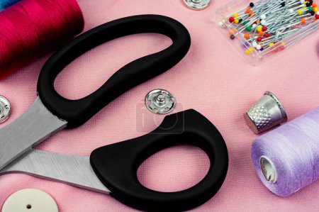 Photo for Sewing kit, scissors, needles and colorful thread. Sewing items - Royalty Free Image