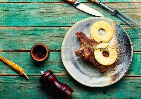Photo for Tasty grilled beef meat with pineapple in pineapple sauce. Copy space - Royalty Free Image