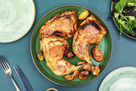 Photo for Prepared barbecue chicken thighs. Fried chicken meat quarters. Top view - Royalty Free Image