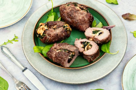 Photo for Beef meat rolls stuffed with mushrooms and greens. Homemade baked beef - Royalty Free Image