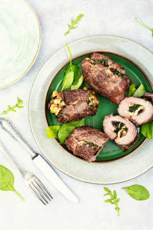 Photo for Veal meat rolls stuffed with mushrooms and herbs. Dish of beef - Royalty Free Image