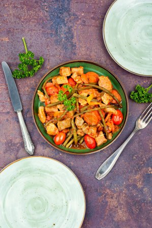 Photo for Stewed meat with carrots and green beans. Ragout with meat and vegetables. Flat lay - Royalty Free Image