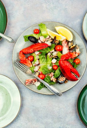 Photo for Homemade salad of shrimp, mussels, lobster and vegetables. - Royalty Free Image