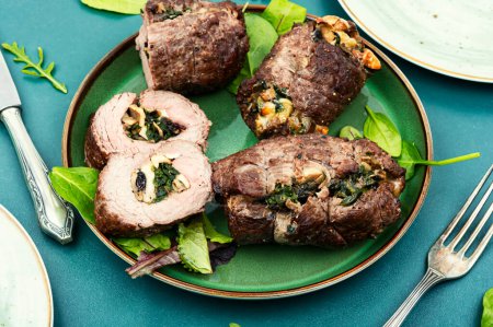 Photo for Veal meat rolls stuffed with mushrooms and herbs. German traditional cuisine - Royalty Free Image