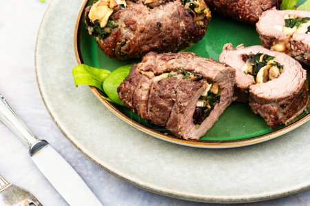 Photo for Beef meat rolls stuffed with mushrooms and green. Delicious beef roll filled - Royalty Free Image