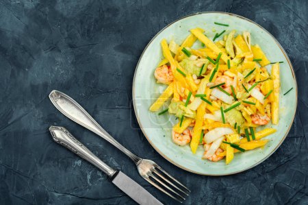 Photo for Delicious fresh salad with grilled prawns, mango, avocado and pine nuts. Copy space. - Royalty Free Image