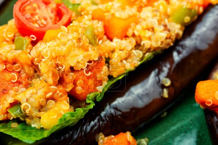 Photo for Grilled eggplant stuffed with pumpkin and quinoa. Vegetarian food recipe - Royalty Free Image