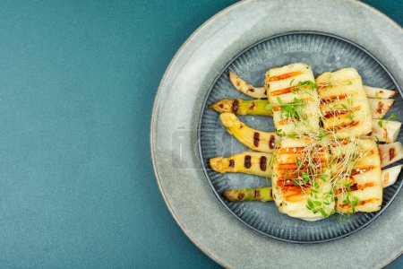 Photo for Warm salad with white asparagus and fried halloumi cheese. Healthy food, space for text - Royalty Free Image