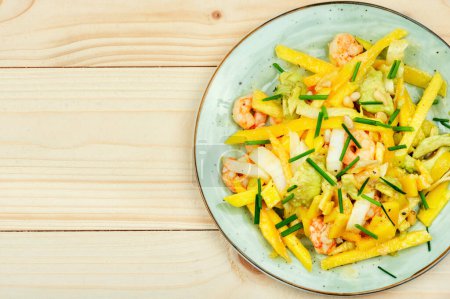 Photo for Salad with grilled prawns, mango, avocado and pine nuts.Copy space, recipe place - Royalty Free Image
