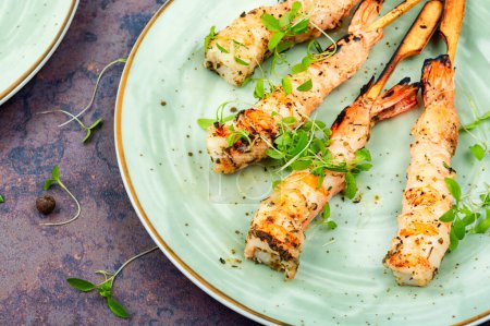 Photo for Shrimp barbecue, shrimps prawns skewers with herbs. Grilled shrimp - Royalty Free Image