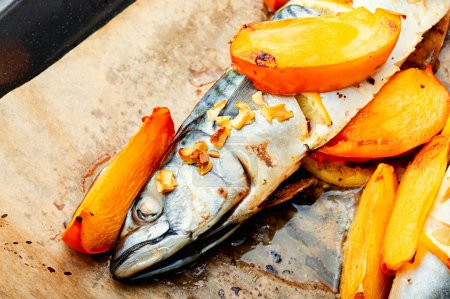 Photo for Roasted appetizing mackerel fish in persimmon fruit sauce. - Royalty Free Image