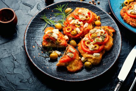 Photo for Chicken chops with tomato, olives and cheese.Chicken schnitzel - Royalty Free Image