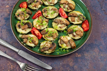 Photo for Baked zucchini with mushrooms and herbs. Homemade food - Royalty Free Image