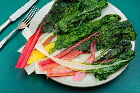 Photo for Tasty stewed colorful chard on a plate. Sauteed swiss chard - Royalty Free Image