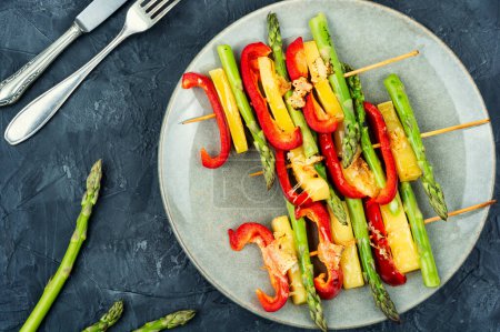 Photo for Diet skewers of asparagus, peppers and cheese. Vegetable skewers on stick - Royalty Free Image