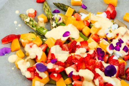 Photo for Summer healthy salad with spice, strawberries, yogurt and mango. - Royalty Free Image