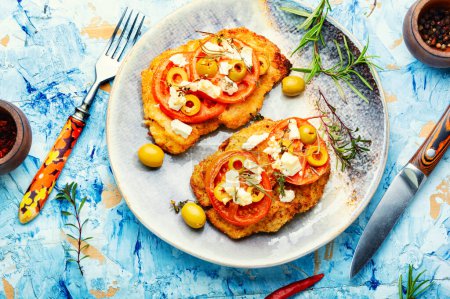 Photo for Chicken schnitzel with piece tomato, olives and cheese. Healthy keto. Top view - Royalty Free Image