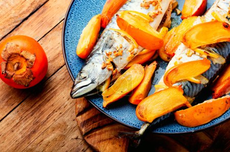 Photo for Mackerel fish baked in persimmon fruit sauce. Barbeque grill food. - Royalty Free Image