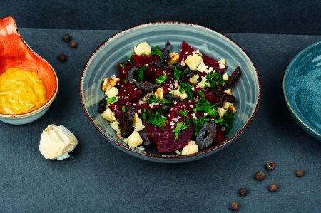 Photo for Diet salad of beets, nuts and cheese in bowl. - Royalty Free Image