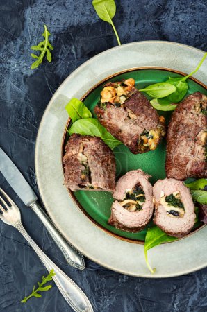 Photo for Beef meat rolls stuffed with mushrooms and herbs. Dish of beef - Royalty Free Image