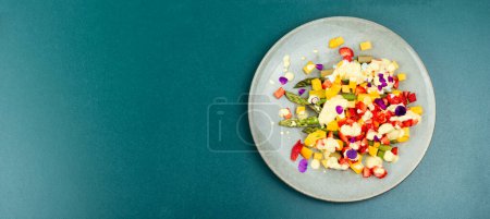 Photo for Colorful healthy salad with spice, strawberries, yogurt and mango. Copy space. Banner. - Royalty Free Image