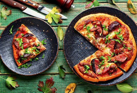Photo for Appetizing pizza or flatbread with bacon and autumn fruit, figs. - Royalty Free Image