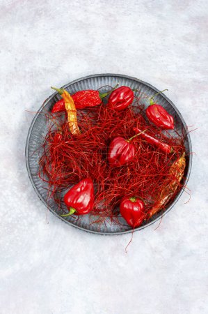 Photo for Spicy seasoning, spice, cut from red pepper. Thinly sliced pepper. - Royalty Free Image