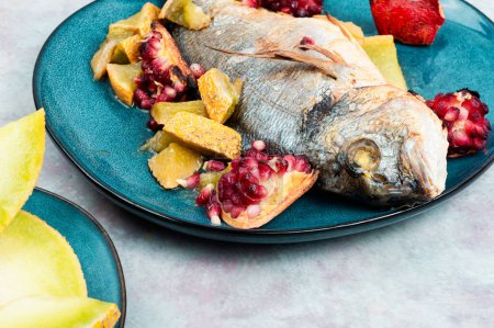 Photo for Delicious dorado baked on a grill with melon, seafood. - Royalty Free Image
