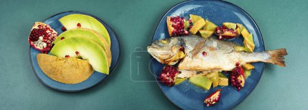 Photo for Baked whole dorado fish with melon, seafood. Top view, long banner. - Royalty Free Image