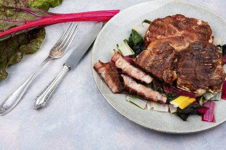 Photo for Barbecue meat steak and fresh herb salad. - Royalty Free Image